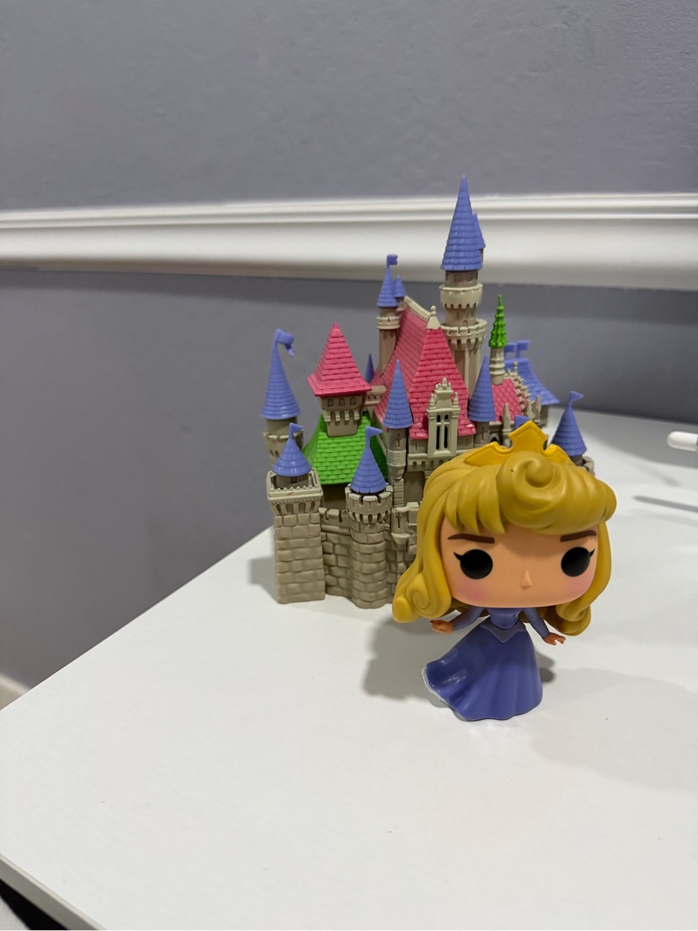 Funko Aurora Figure with Purple Dress and Multicolor Castle